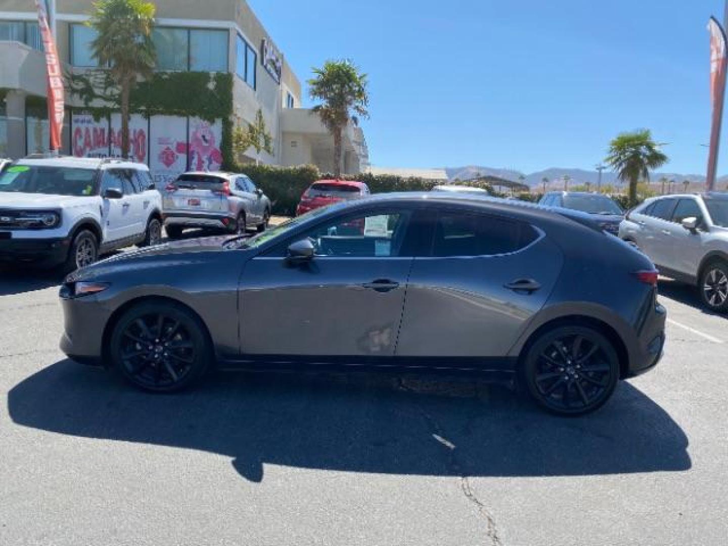 2021 GRAY Mazda Mazda3 Hatchback (JM1BPBML2M1) with an 4-Cyl SKYACTIV-G 2.5 Liter engine, Automatic 6-Spd SKYACTIV-Drive w/Manual transmission, located at 412 Auto Vista Drive, Palmdale, 93551, (661) 945-0620, 34.592636, -118.136681 - Photo#3