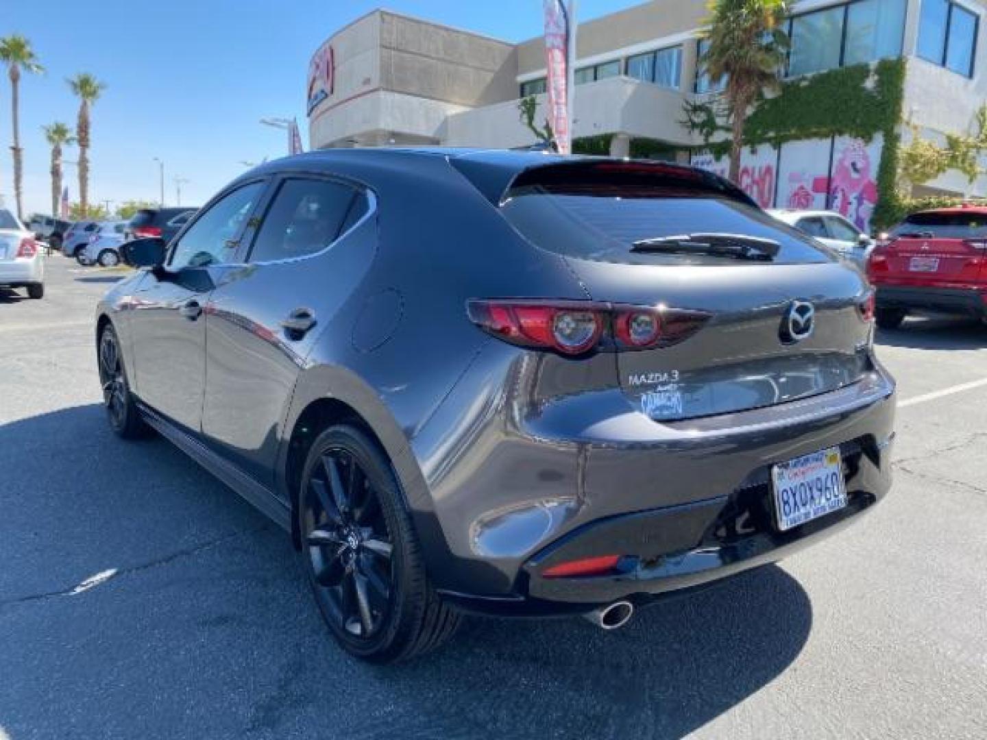 2021 GRAY Mazda Mazda3 Hatchback (JM1BPBML2M1) with an 4-Cyl SKYACTIV-G 2.5 Liter engine, Automatic 6-Spd SKYACTIV-Drive w/Manual transmission, located at 412 Auto Vista Drive, Palmdale, 93551, (661) 945-0620, 34.592636, -118.136681 - Photo#4