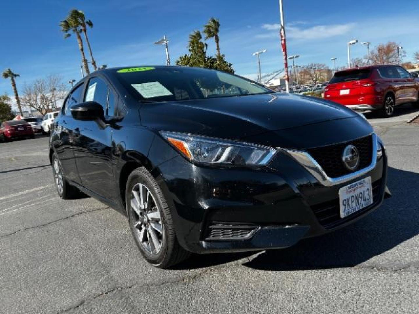 2021 BLACK Nissan Versa (3N1CN8EV5ML) with an 4-Cyl 1.6 Liter engine, Automatic CVT w/Xtronic transmission, located at 412 Auto Vista Drive, Palmdale, 93551, (661) 945-0620, 34.592636, -118.136681 - Photo#0