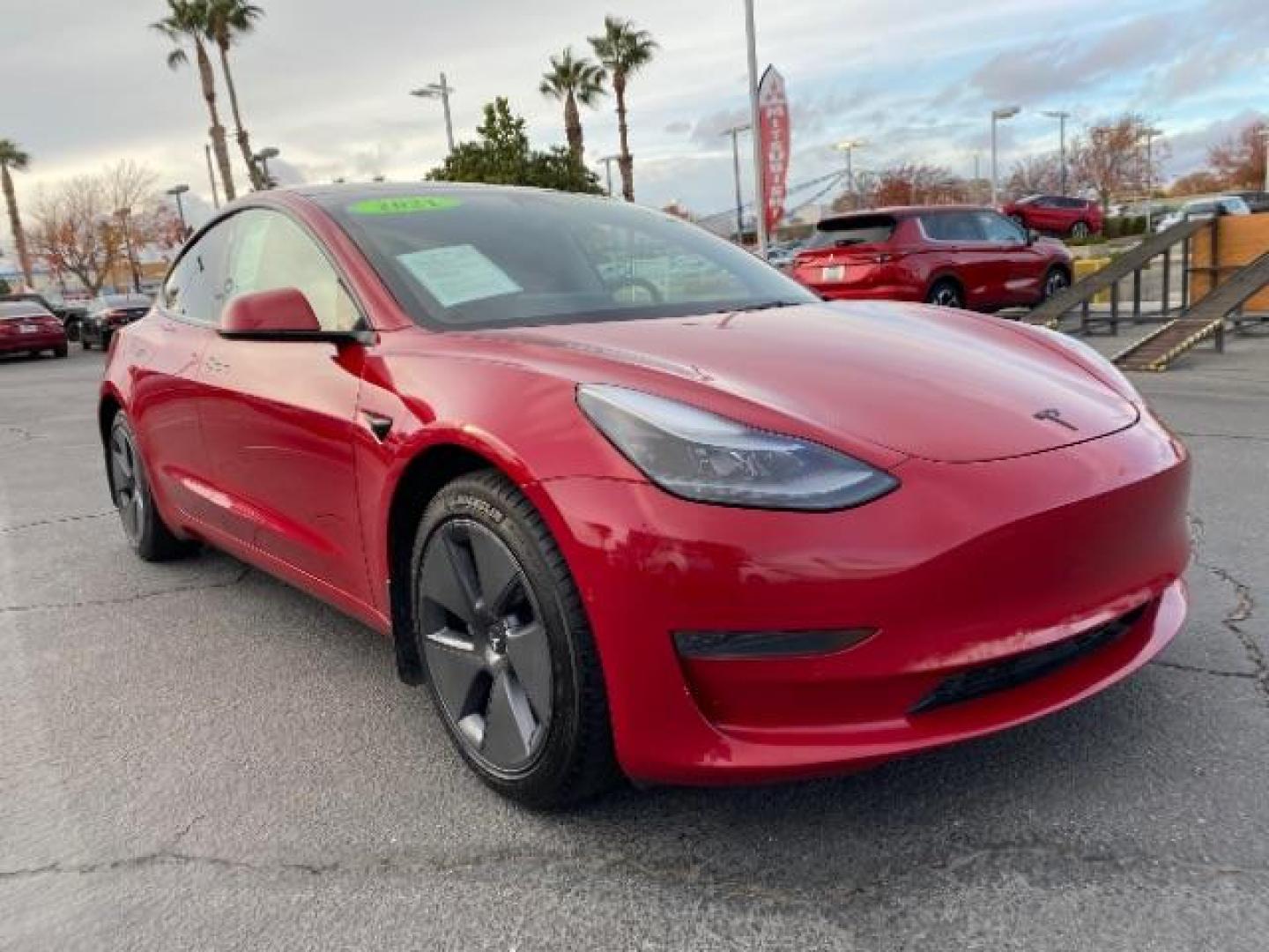 2021 RED Tesla Model 3 (5YJ3E1EA3MF) with an AC Electric Motor engine, Single-Speed Fixed Gear transmission, located at 412 Auto Vista Drive, Palmdale, 93551, (661) 945-0620, 34.592636, -118.136681 - Photo#0