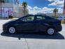 2021 BLACK Toyota Prius (JTDKAMFU1M3) with an 4-Cyl Hybrid 1.8 Liter engine, Automatic ECVT transmission, located at 412 Auto Vista Drive, Palmdale, 93551, (661) 945-0620, 34.592636, -118.136681 - Photo#3