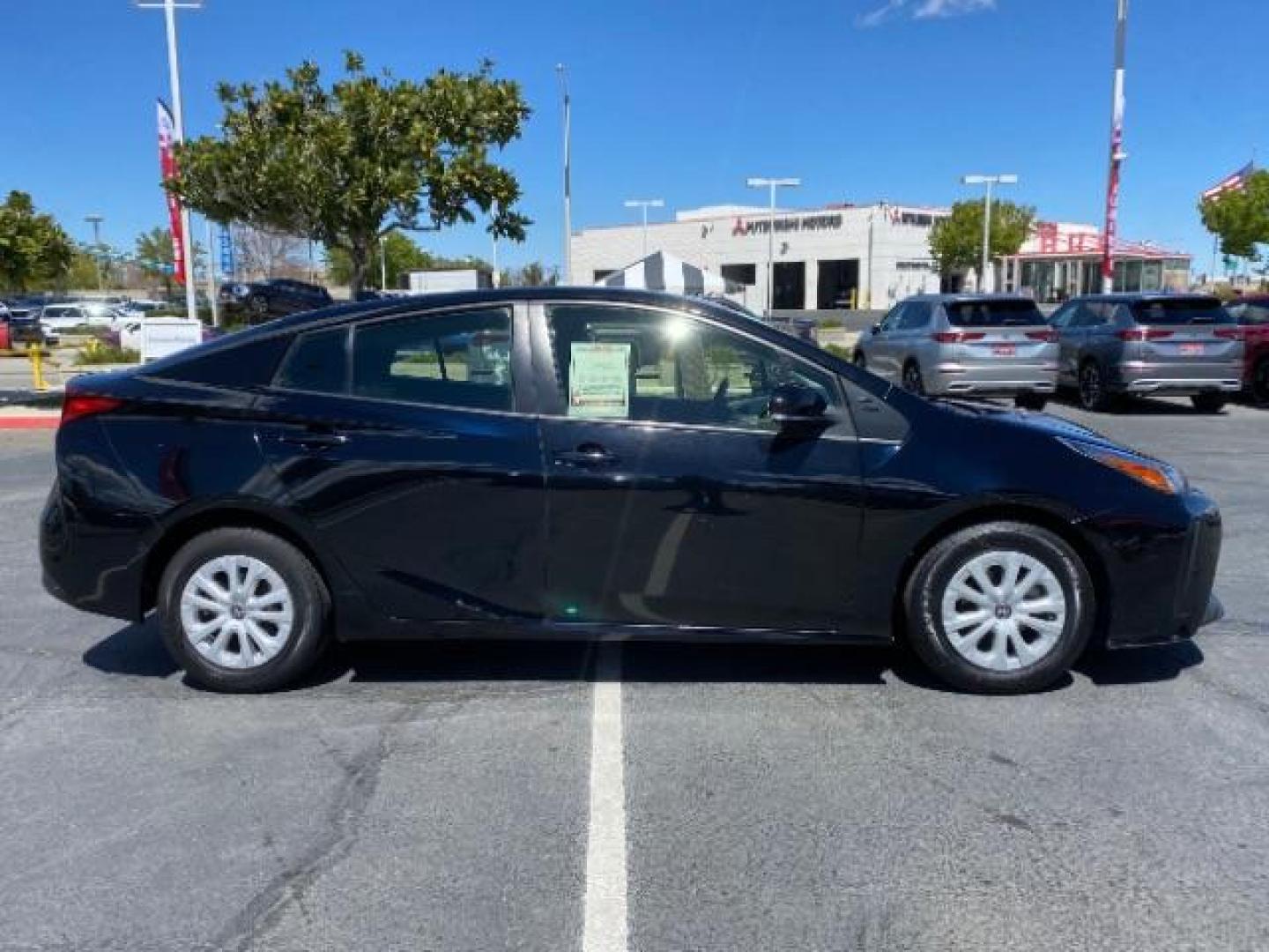 2021 BLACK Toyota Prius (JTDKAMFU1M3) with an 4-Cyl Hybrid 1.8 Liter engine, Automatic ECVT transmission, located at 412 Auto Vista Drive, Palmdale, 93551, (661) 945-0620, 34.592636, -118.136681 - Photo#7