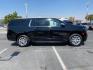 2023 BLACK Chevrolet Suburban (1GNSCFKD3PR) with an 8-Cyl 5.3 Liter engine, Automatic 10-Spd w/Overdrive transmission, located at 412 Auto Vista Drive, Palmdale, 93551, (661) 945-0620, 34.592636, -118.136681 - Photo#6