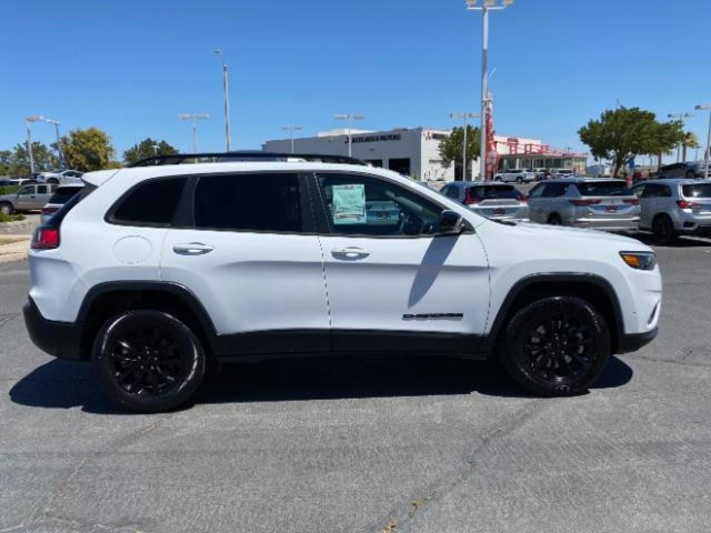 2023 WHITE Jeep Cherokee (1C4PJMMB6PD) with an 4-Cyl 2.4 Liter engine, Automatic 9-Spd transmission, located at 412 Auto Vista Drive, Palmdale, 93551, (661) 945-0620, 34.592636, -118.136681 - Photo#7