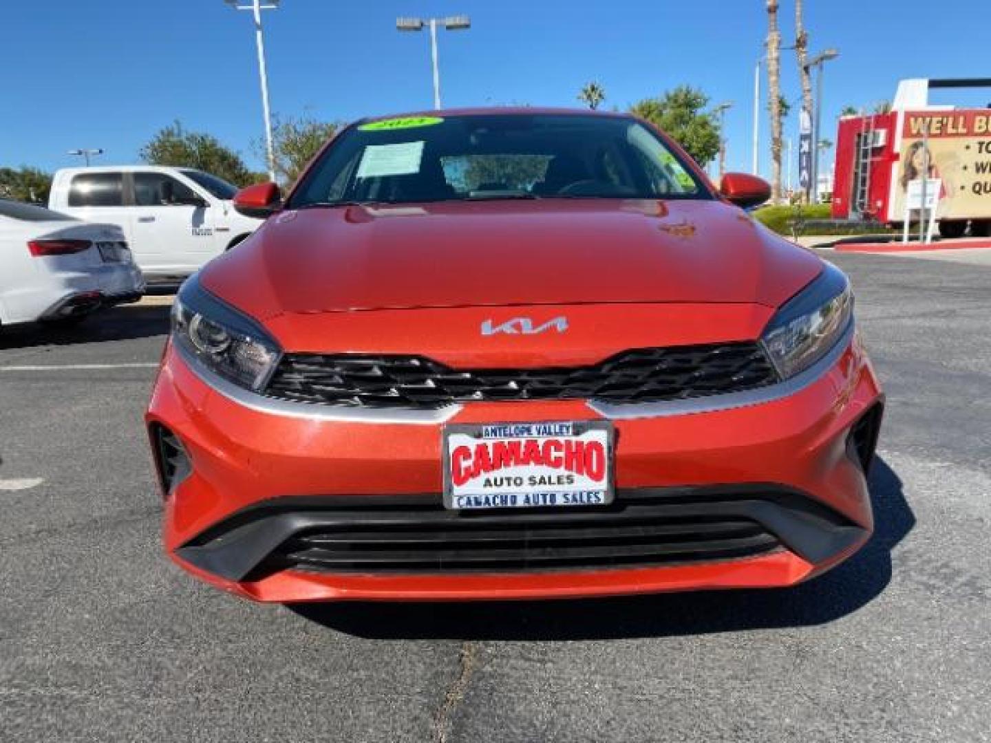 2023 ORANGE Kia Forte (3KPF24AD0PE) with an 4-Cyl 2.0 Liter engine, Automatic IVT transmission, located at 412 Auto Vista Drive, Palmdale, 93551, (661) 945-0620, 34.592636, -118.136681 - Photo#2