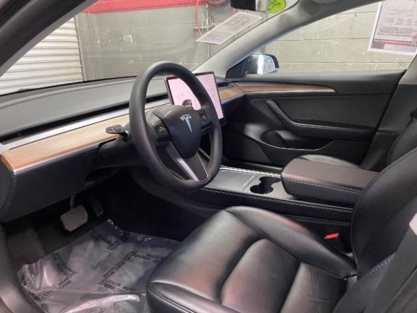 2023 BLACK Tesla Model 3 (5YJ3E1EA8PF) with an AC Electric Motor engine, Single-Speed Fixed Gear transmission, located at 412 Auto Vista Drive, Palmdale, 93551, (661) 945-0620, 34.592636, -118.136681 - Photo#10