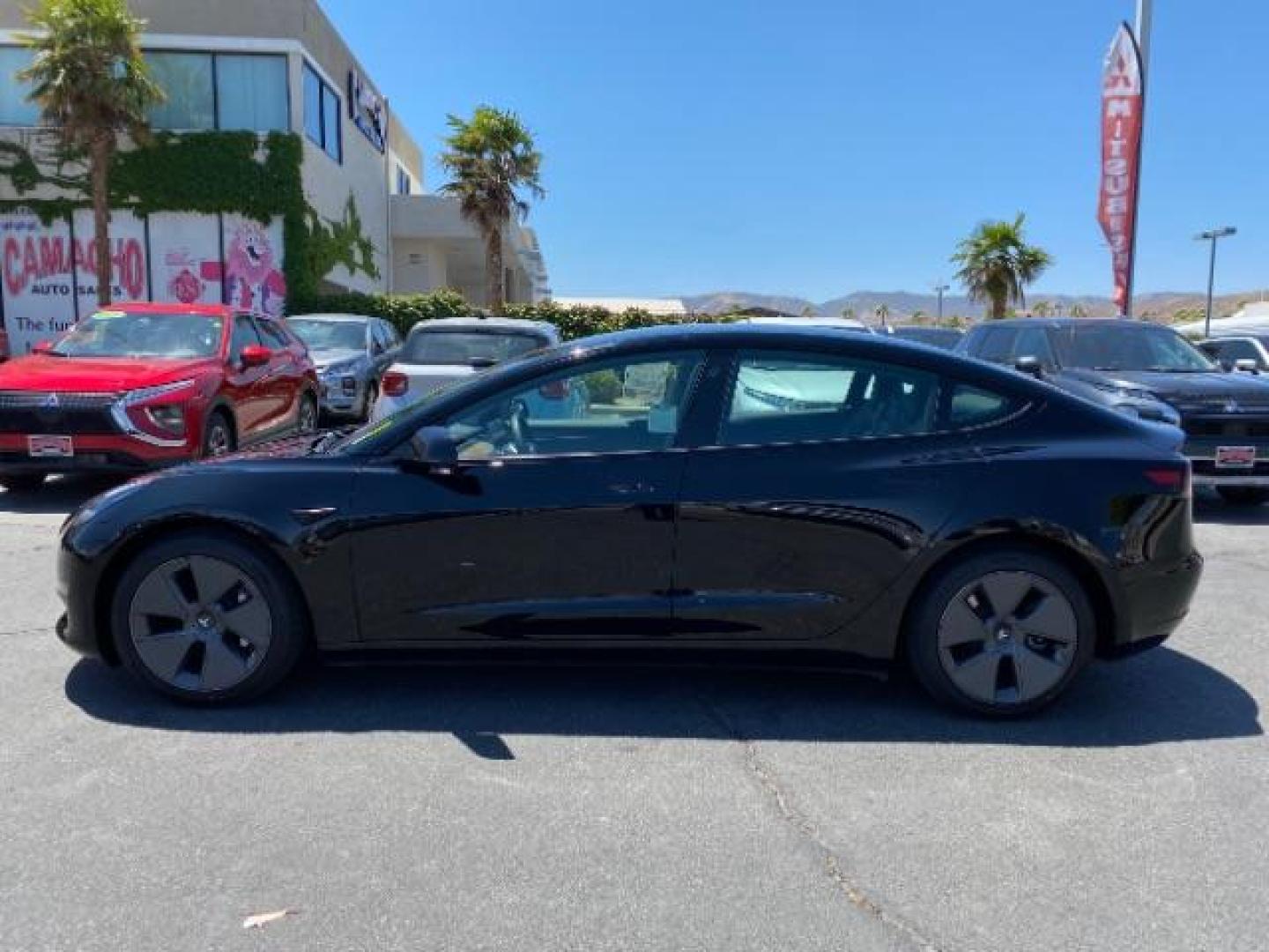 2023 BLACK Tesla Model 3 (5YJ3E1EA8PF) with an AC Electric Motor engine, Single-Speed Fixed Gear transmission, located at 412 Auto Vista Drive, Palmdale, 93551, (661) 945-0620, 34.592636, -118.136681 - Photo#4