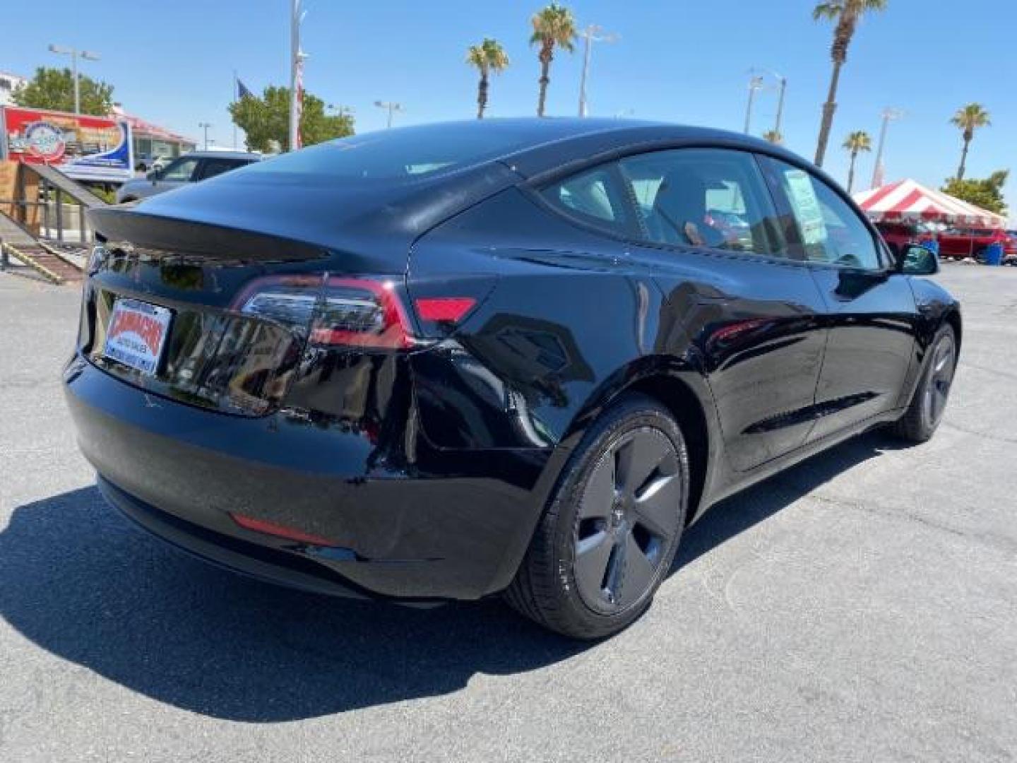 2023 BLACK Tesla Model 3 (5YJ3E1EA8PF) with an AC Electric Motor engine, Single-Speed Fixed Gear transmission, located at 412 Auto Vista Drive, Palmdale, 93551, (661) 945-0620, 34.592636, -118.136681 - Photo#7